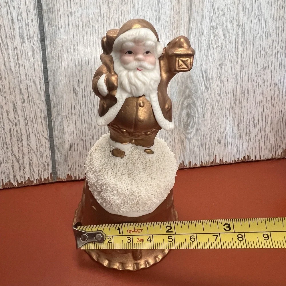 Vintage World Bazaars Inc. Holiday Collection Gold Suited Porcelain Santa‎ Bell